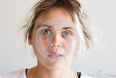 Young woman looking anxious Stock Photo