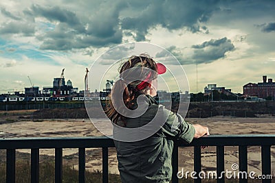 Young woman looking at city Stock Photo