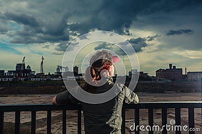 Young woman looking at city Stock Photo