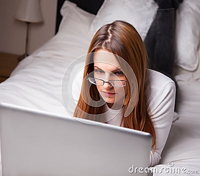 Young woman looking at laptop Stock Photo