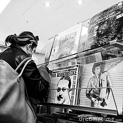 Young Woman Looking Though Collection Of Vinyl Long Playing Records Editorial Stock Photo