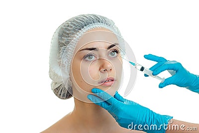 A young woman makes a in the face by a doctor Stock Photo