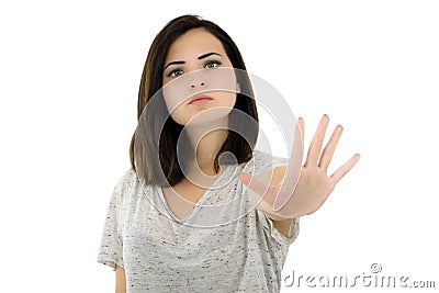 Young woman making stop gesture Stock Photo