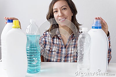 Young woman and cleaning products Stock Photo