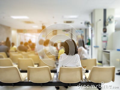 Young woman and many people waiting medical and health services to the hospital,patients waiting treatment at the hospital Editorial Stock Photo