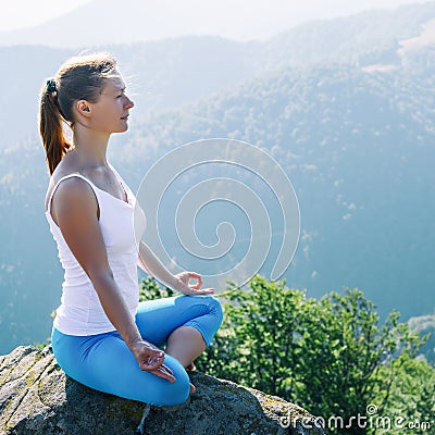 Young woman meditate Stock Photo