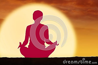 Young woman meditating with Muladhara chakra Stock Photo