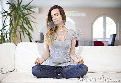 Young woman meditating Stock Photo