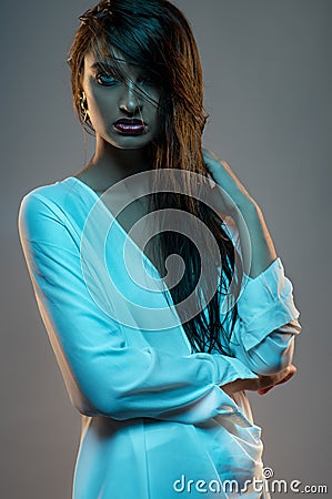 Young woman model in blue dress Stock Photo