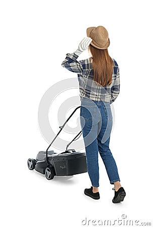 Young woman with modern lawn mower on white background, back view Stock Photo