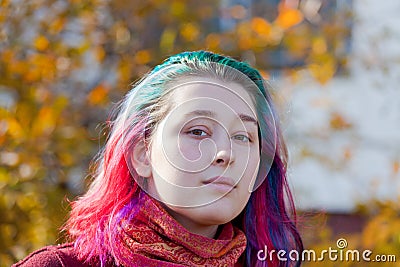 Young woman with multicoloured streaks hair Stock Photo