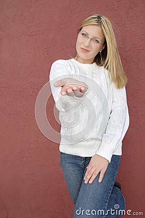 Young woman offering a hand Stock Photo