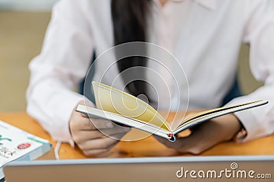 Young woman online job hunting working with laptop computer, blank screen Stock Photo