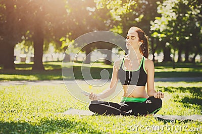 Young woman outdoors, relax meditation pose Stock Photo