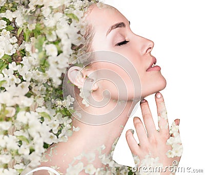 Young woman over blooming tree floral Stock Photo