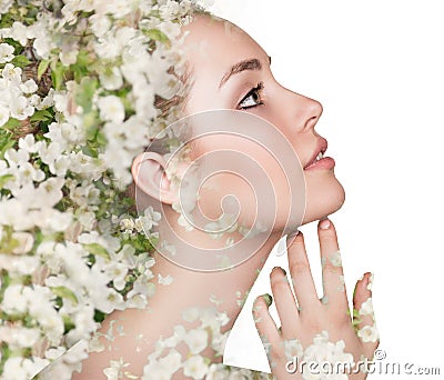 Young woman over blooming tree floral Stock Photo