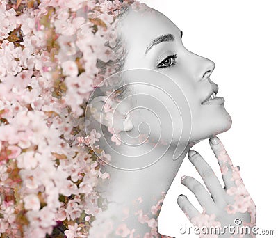 Young woman over blooming tree floral Stock Photo