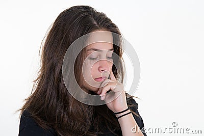 Young woman over isolated white background unhappy girl frustrated pensive Stock Photo