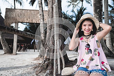 Young woman at paradise beach on vacation at island. Beautiful g Stock Photo