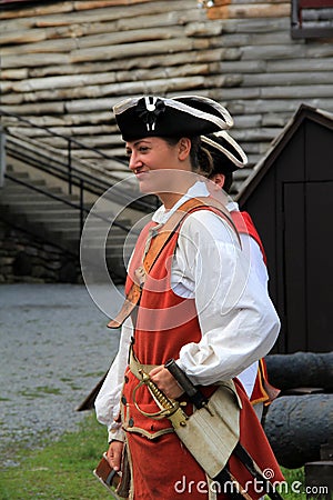 Young woman in period dress, reenacting life of a soldier,Fort William Henry,New York,2016 Editorial Stock Photo