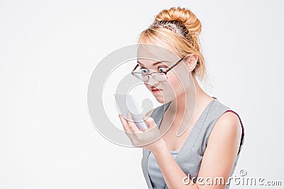 Young woman with phone angry, peeved and irritated Stock Photo