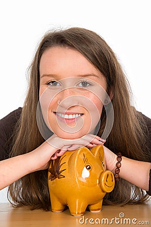 Young woman with piggybank Stock Photo