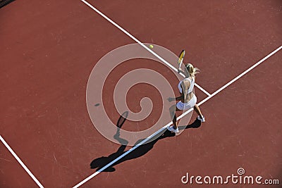 Young woman play tennis outdoor Stock Photo