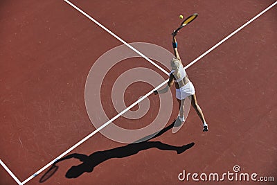 Young woman play tennis outdoor Stock Photo