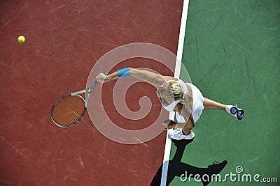 Young woman play tennis outdoor Stock Photo