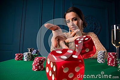 Woman playing in casino Stock Photo