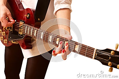 Young woman playing the guitar on white Stock Photo