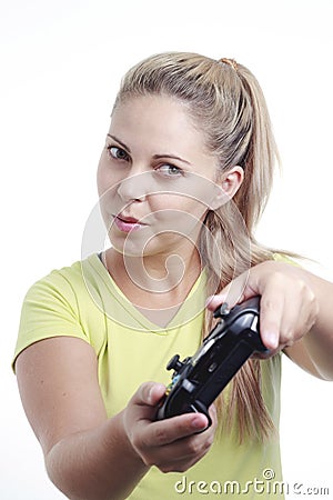 Young woman playing video game with joystick Stock Photo