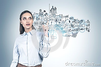 Young woman pointing at business strategy sketch Stock Photo