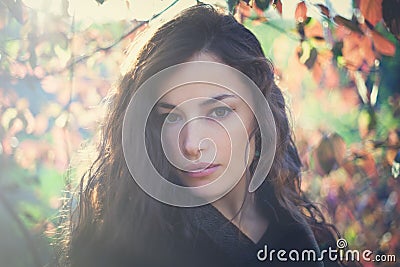 Young woman portrait in forest winter day sunset Stock Photo