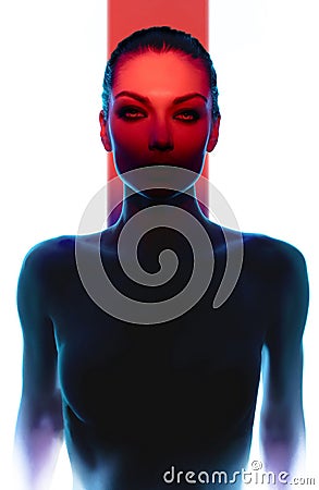 Young woman posing in darkness with red light Stock Photo