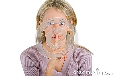 Young woman posing a silence gesture Stock Photo