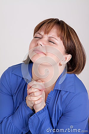 The young woman prays to god Stock Photo