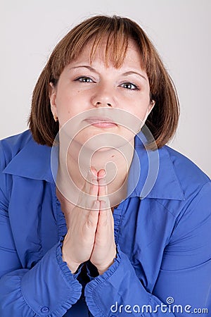 The young woman prays to god Stock Photo