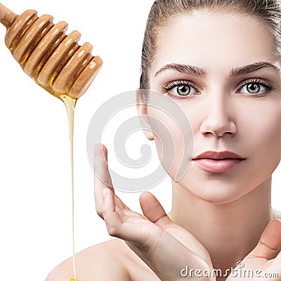 Young woman prepare for honey facial mask. Stock Photo