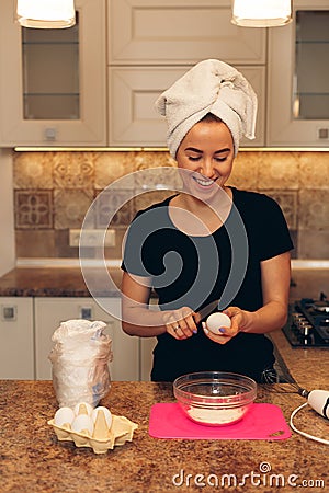 Young woman preparing the dough, bake cookies Stock Photo