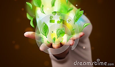 Young woman presenting eco green leaf recycle energy concept Stock Photo