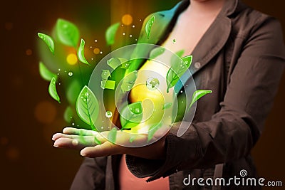 Young woman presenting eco green leaf recycle energy concept Stock Photo