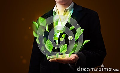 Young woman presenting eco green leaf recycle energy concept Stock Photo