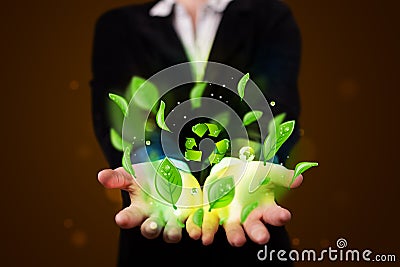 Young woman presenting eco green leaf recycle energy concept Stock Photo