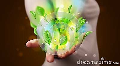 Young woman presenting eco green leaf recycle energy concept Stock Photo