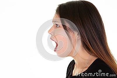 Young woman profile face portrait mouth open on white background Stock Photo