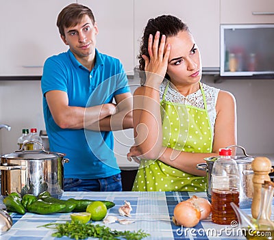 Young woman quarrelling with spouse Stock Photo