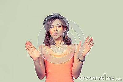 Young woman raising hand up to say no stop right there Stock Photo