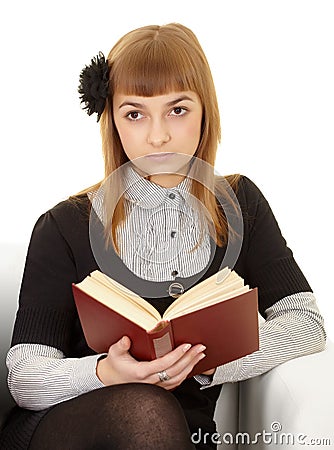Young woman reads a book Stock Photo