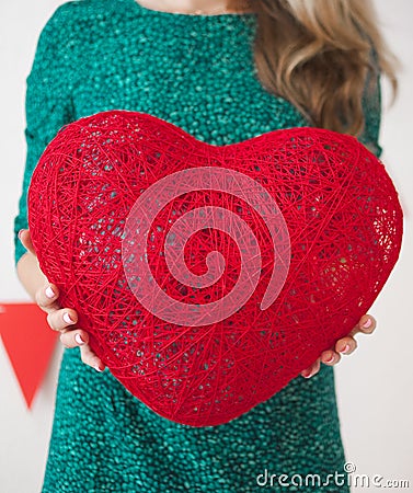 Young woman with the red heart Stock Photo